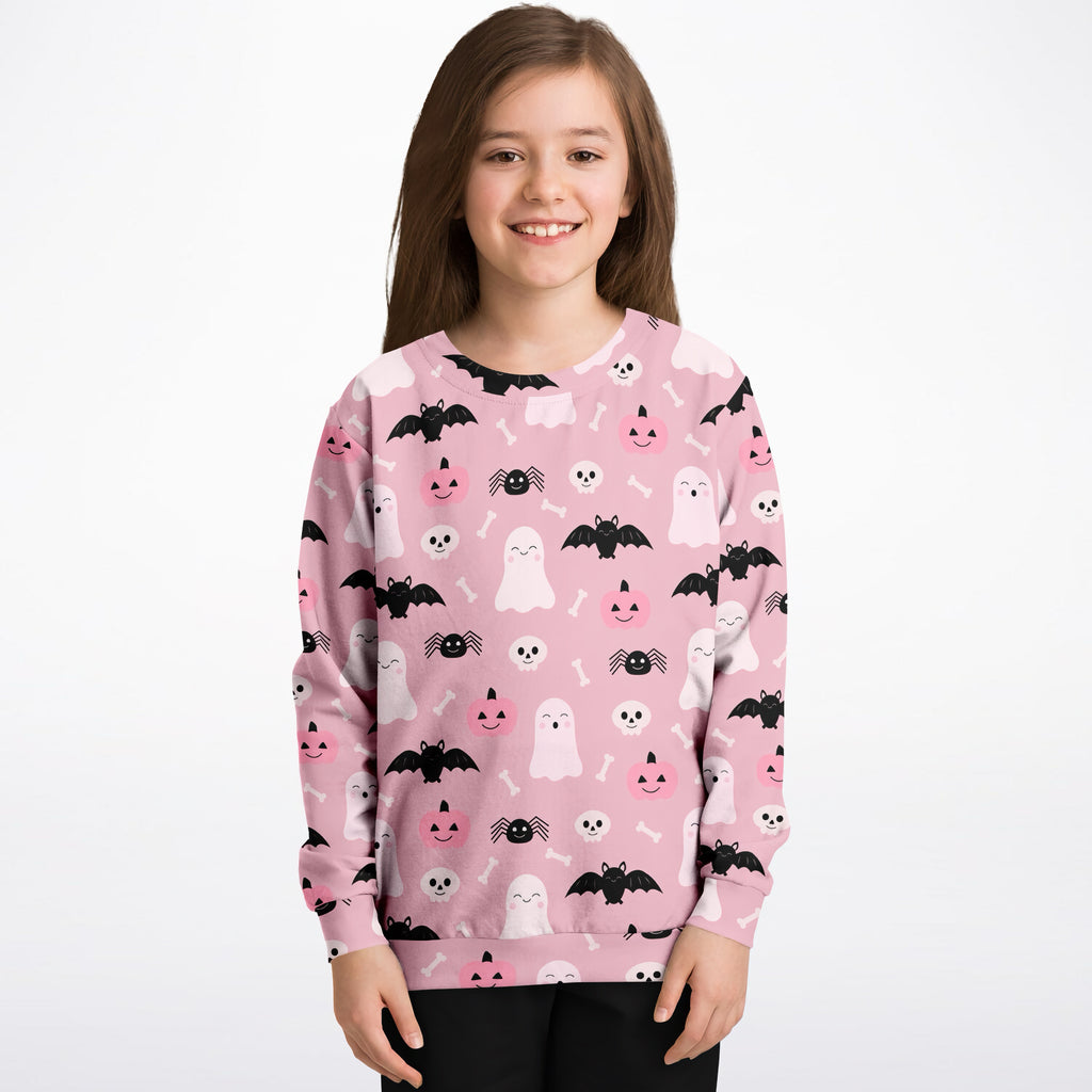 Girls cute ghost and bats pink halloween sweatshirt with smiling pumpkins printed on cozy cotton fleece fabric