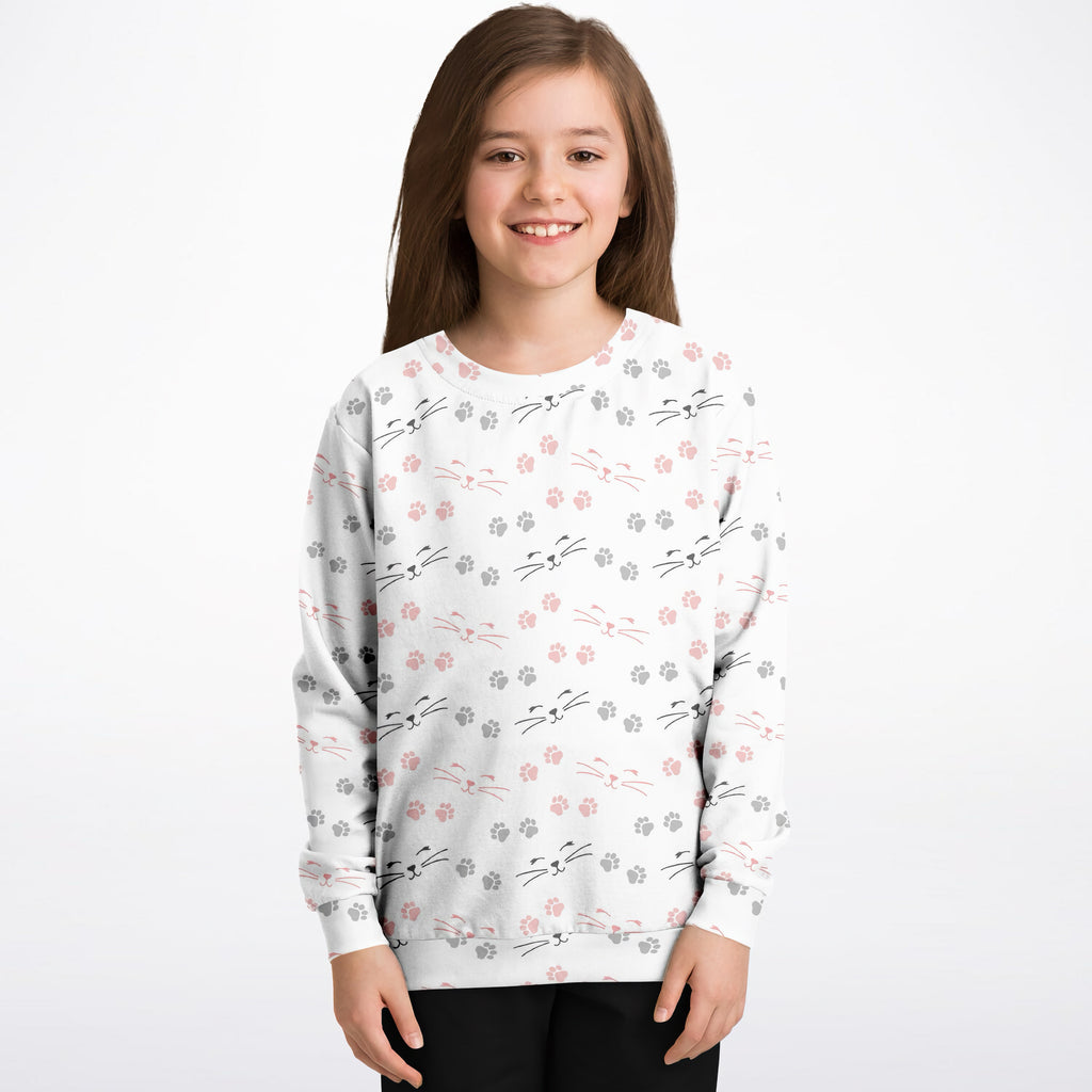 White girls cat paw print sweatshirt with pink gray and black cat faces in cozy cotton fleece fabric