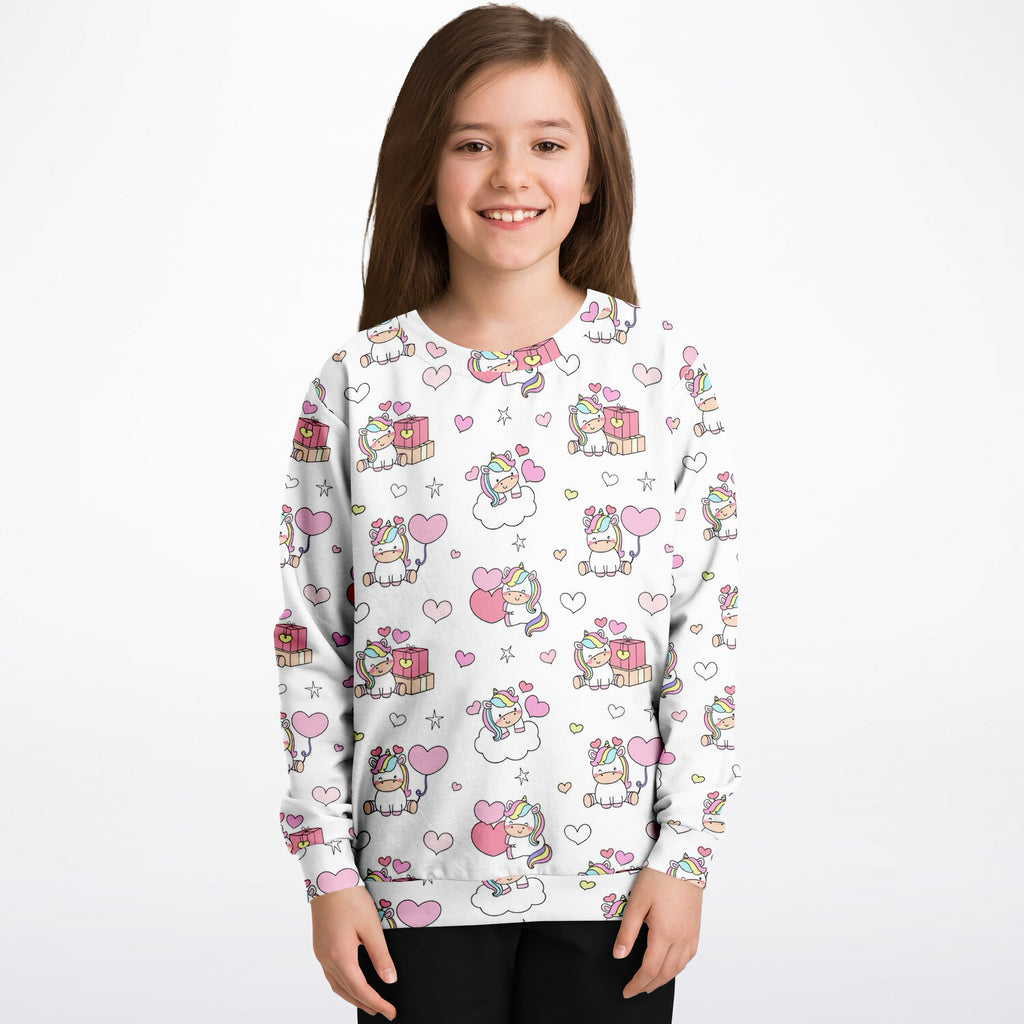 White girls unicorn birthday sweatshirt with playful pastel cartoon print made of cozy cotton fleece or sports fabric