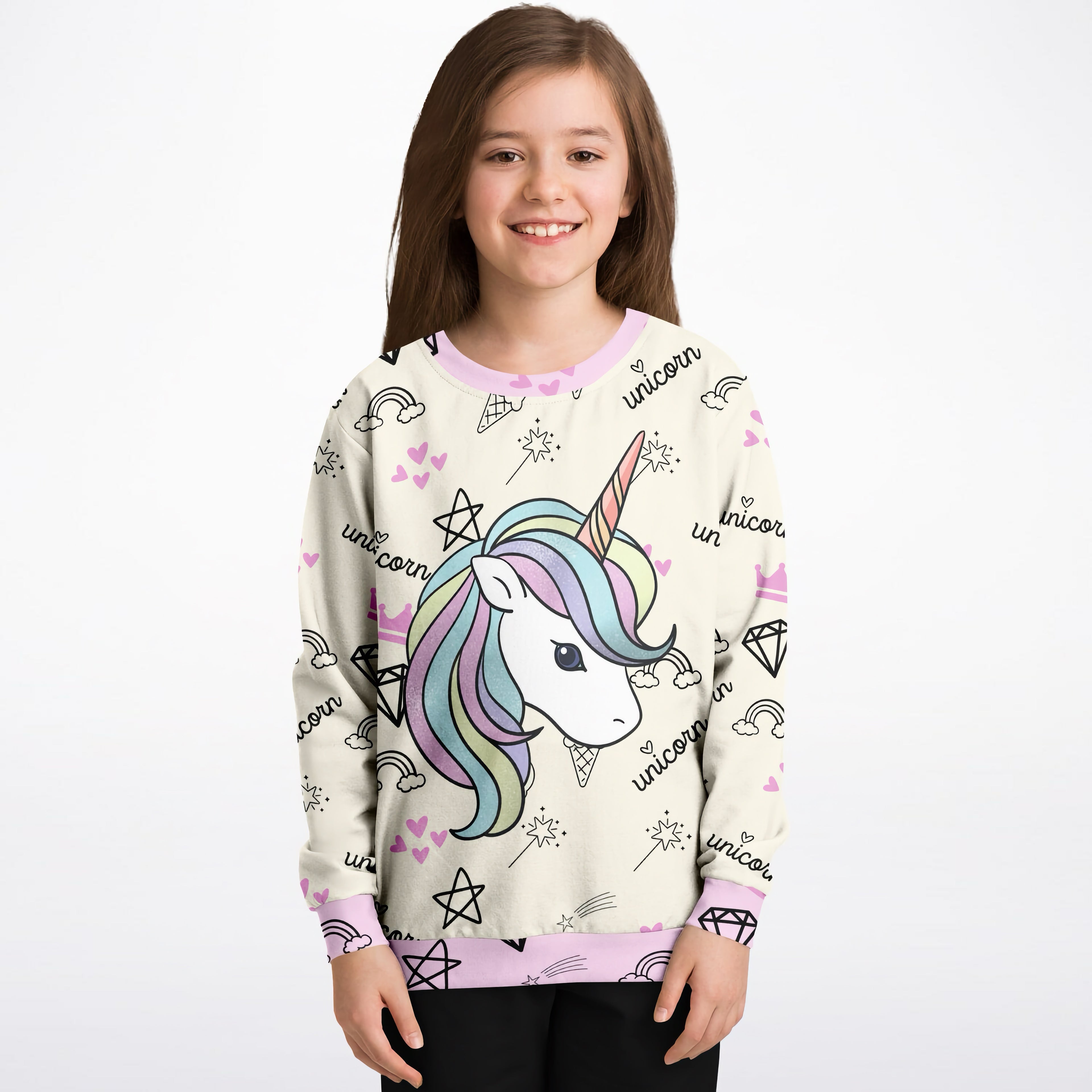 A cream-colored girls magical unicorn sweatshirt with a rainbow unicorn graphic and cotton fleece fabric