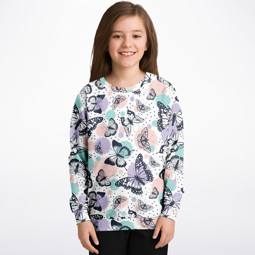 Girls butterfly sweatshirt in white cotton fleece with black purple and teal butterfly pattern and watercolor splashes