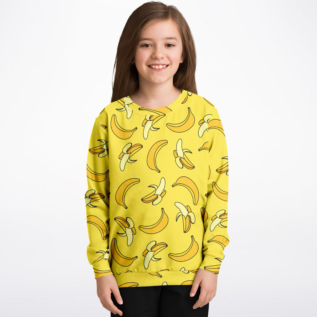 Kids yellow banana-print long-sleeve sweatshirt in cozy cotton fleece or lightweight sports fabric for comfort