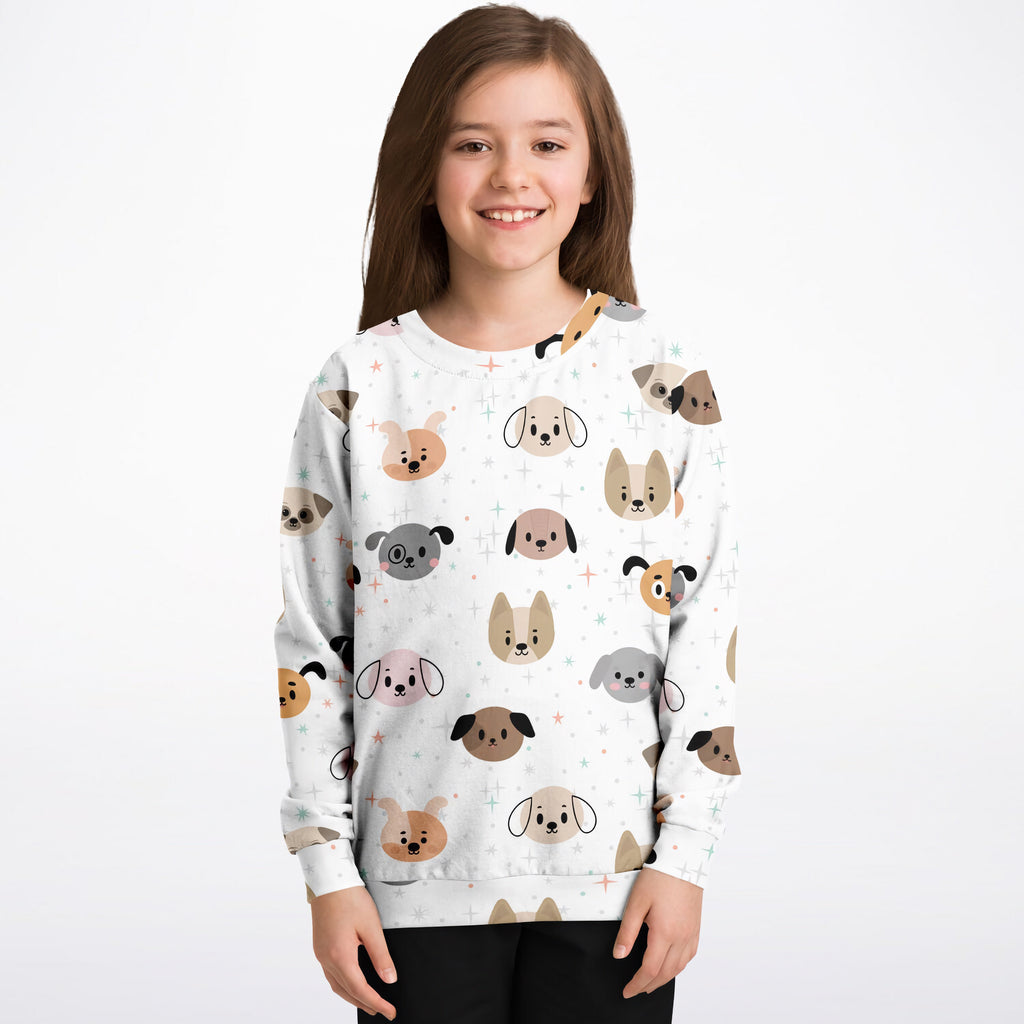 White long-sleeved kids dog face sweatshirt with cartoon dog faces in beige brown and gray tones