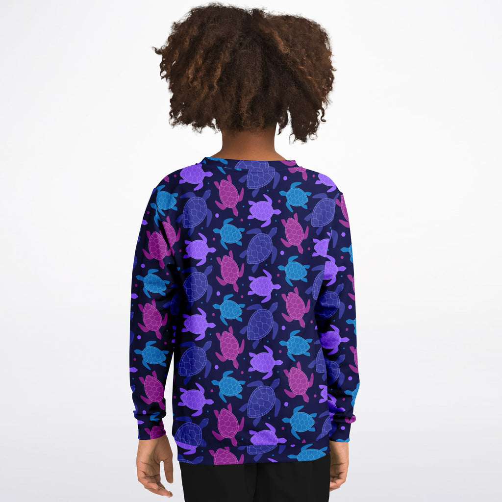 Girls purple sea turtle sweatshirt with vibrant pattern on cozy cotton fleece or lightweight sports fabric