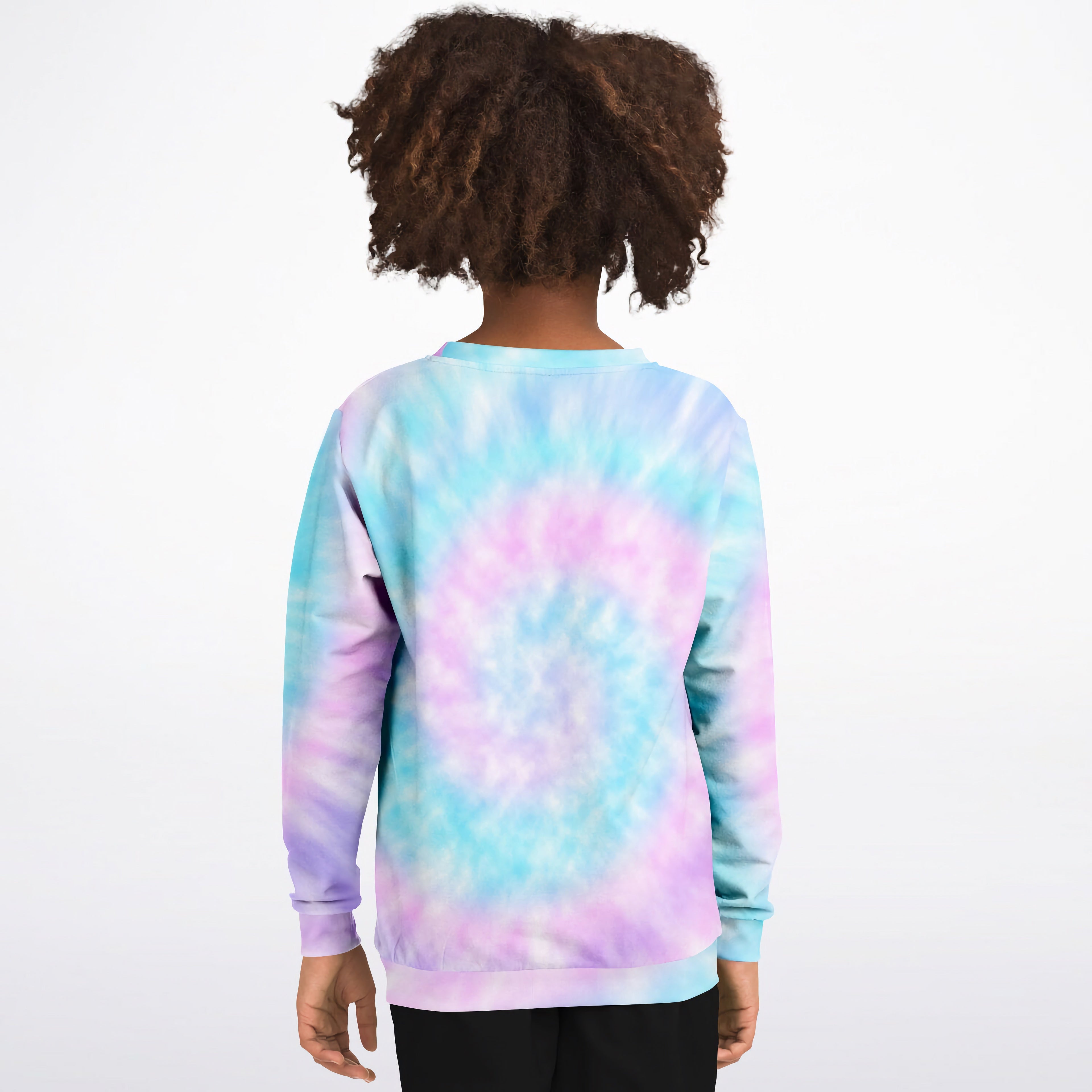 A girl wearing a girls custom age tie dye it’s my birthday sweatshirt with vibrant blue pink and purple cotton fleece