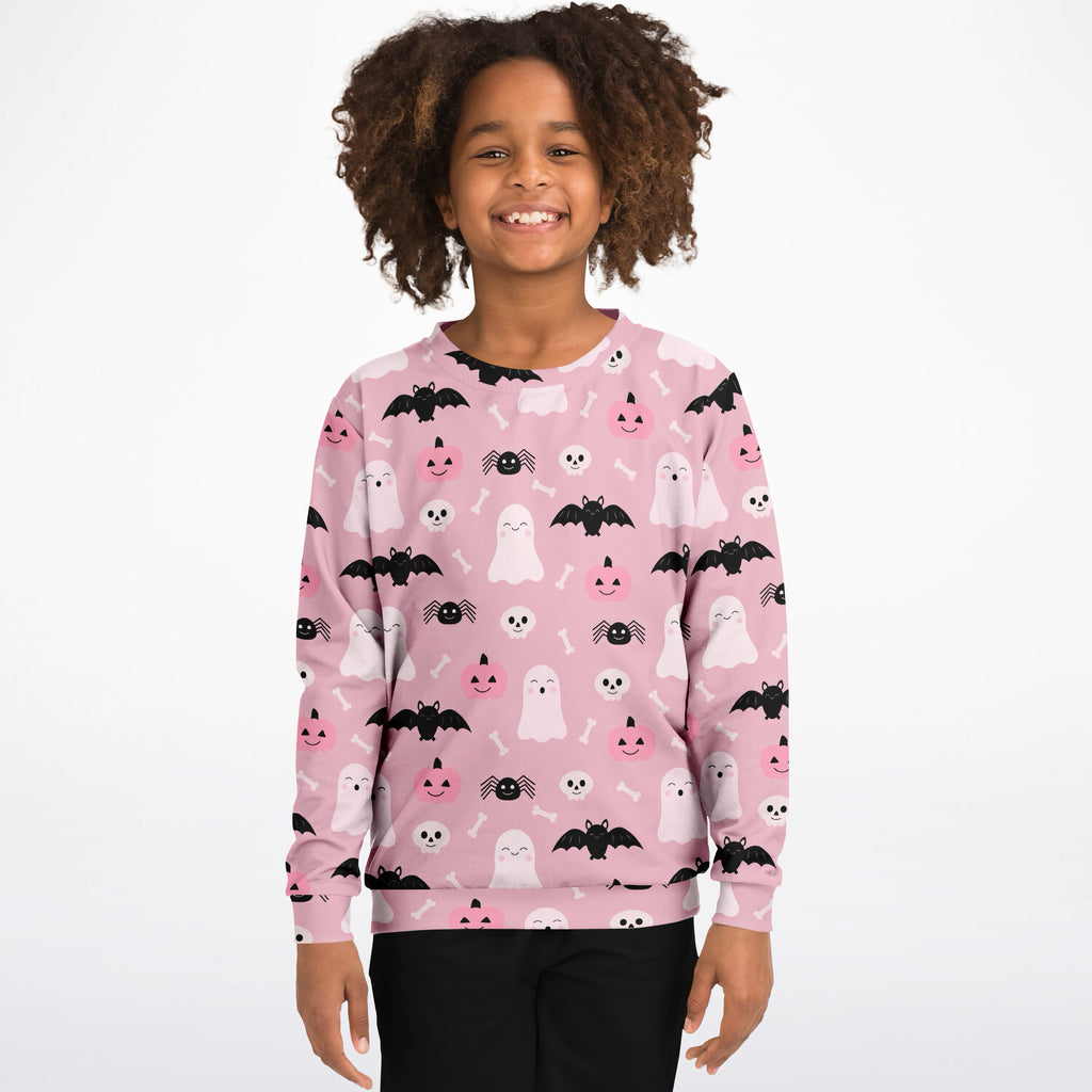 Girls cute ghost and bats pink halloween sweatshirt with playful black and white prints on cozy cotton fleece fabric