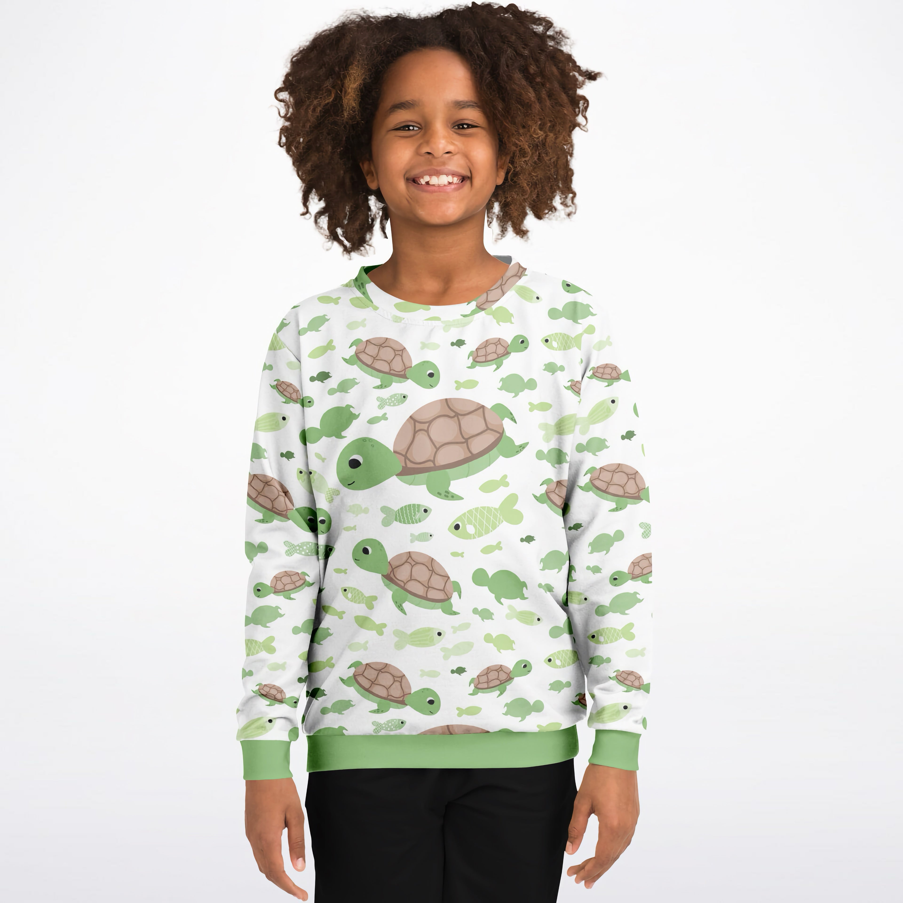 Kids white cotton fleece sweatshirt with green and brown turtles and fish pattern and light green ribbed cuffs and hem