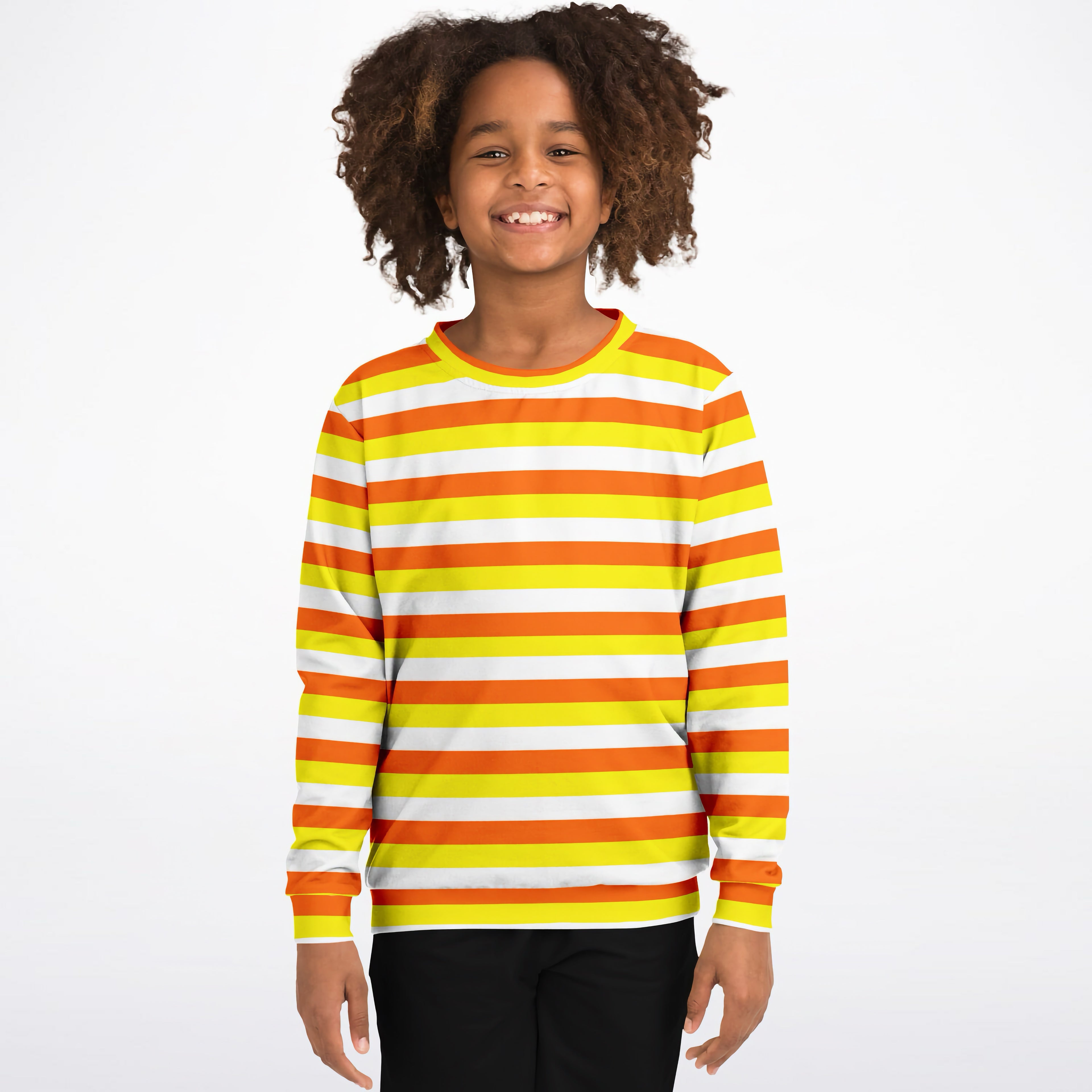A child wearing a kids candy corn stripes halloween sweatshirt with orange yellow white stripes in cozy cotton fleece