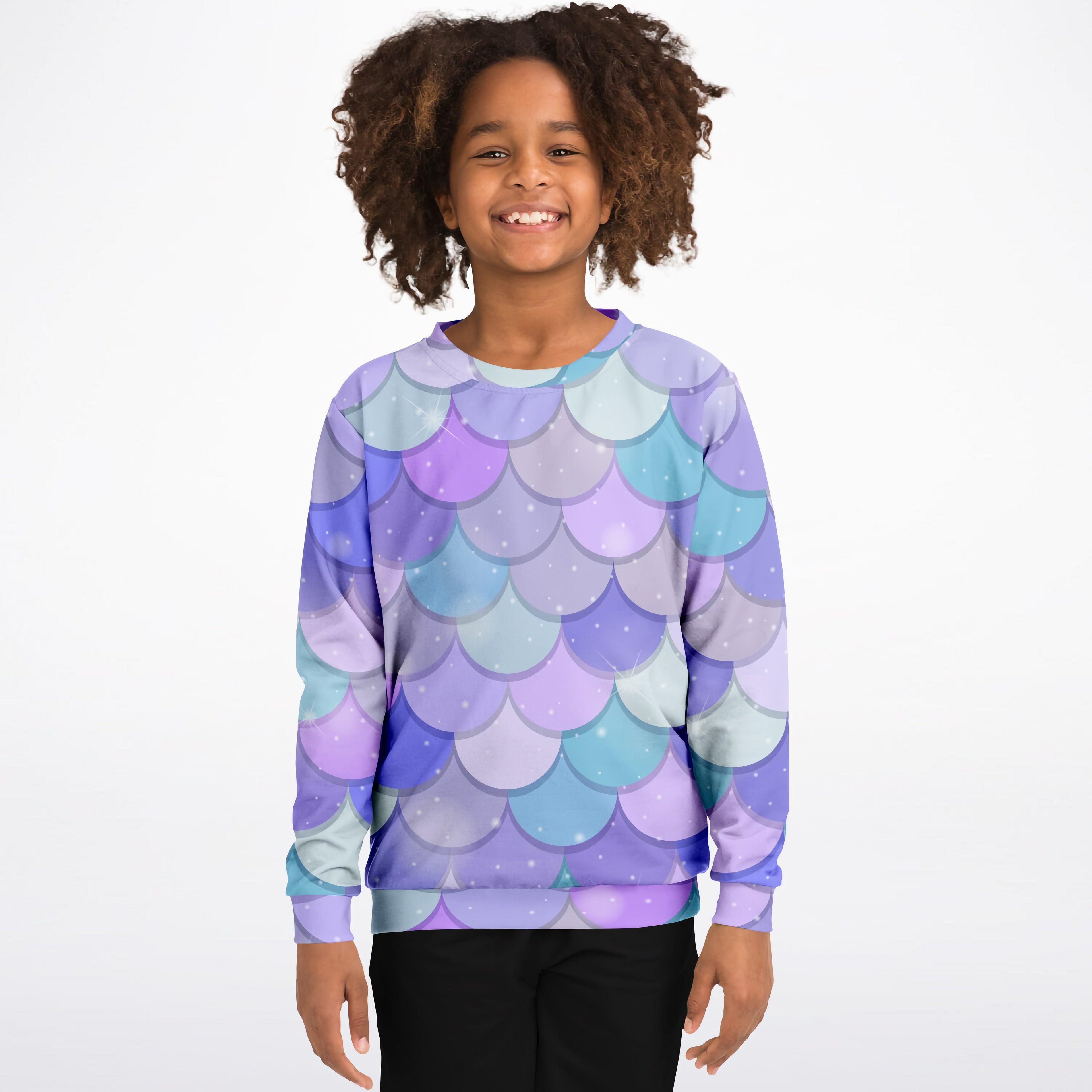 A child wearing a girls purple mermaid scales sweatshirt with cozy cotton fleece featuring purple and blue scale print