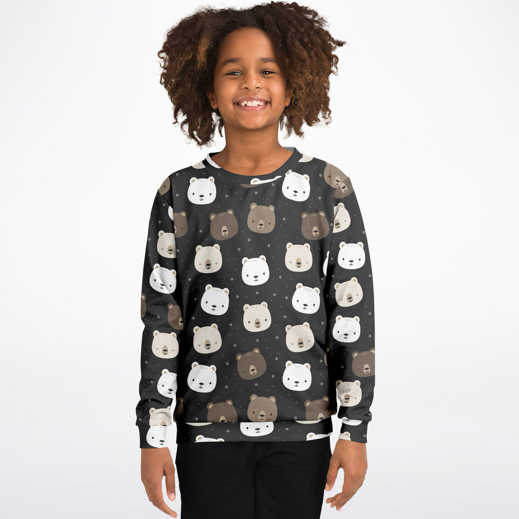 A child wearing a dark gray kids bear face sweatshirt with white and brown cartoon bears in cozy cotton fleece