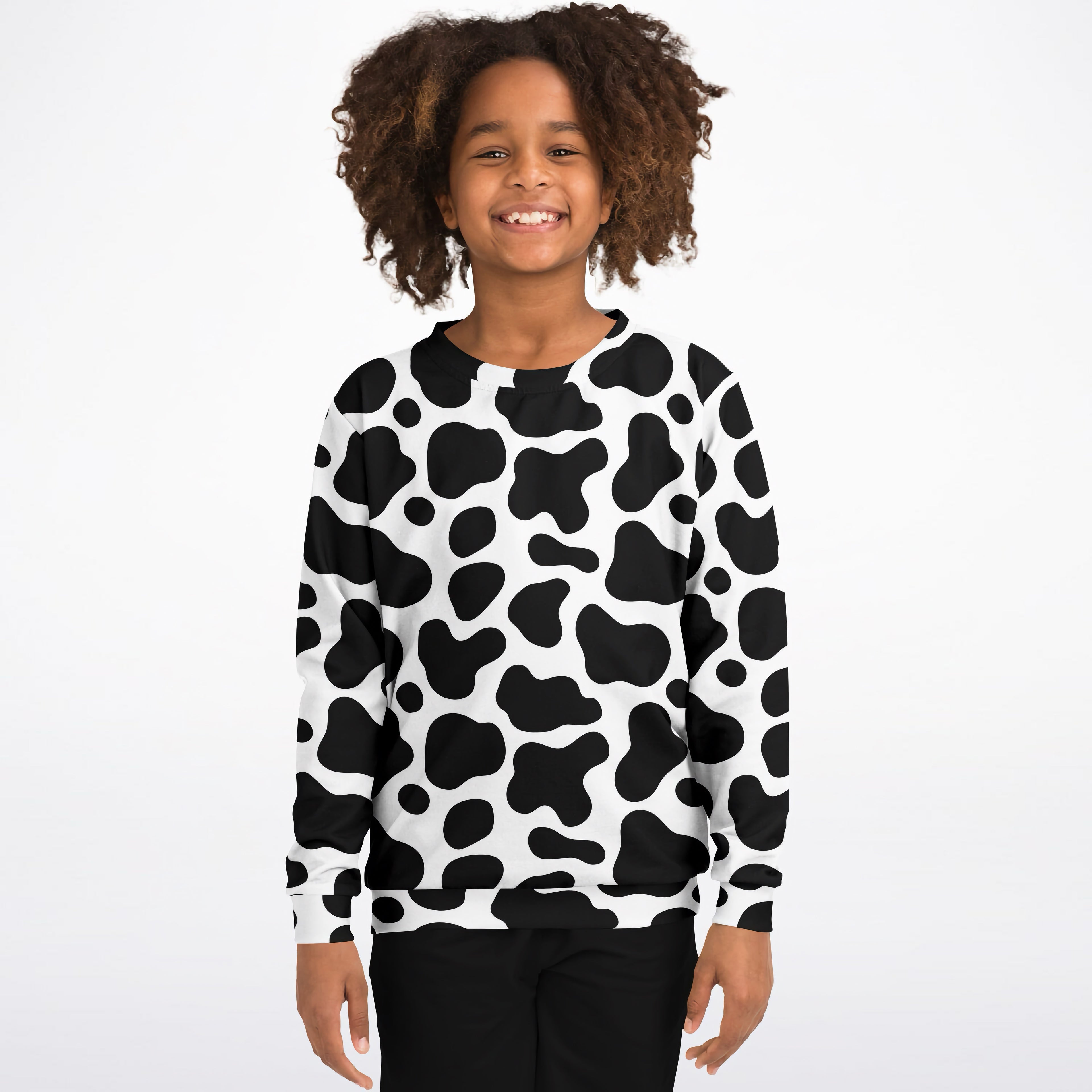 Kids cow print sweatshirt with black and white pattern made of cozy cotton fleece or lightweight sports fabric