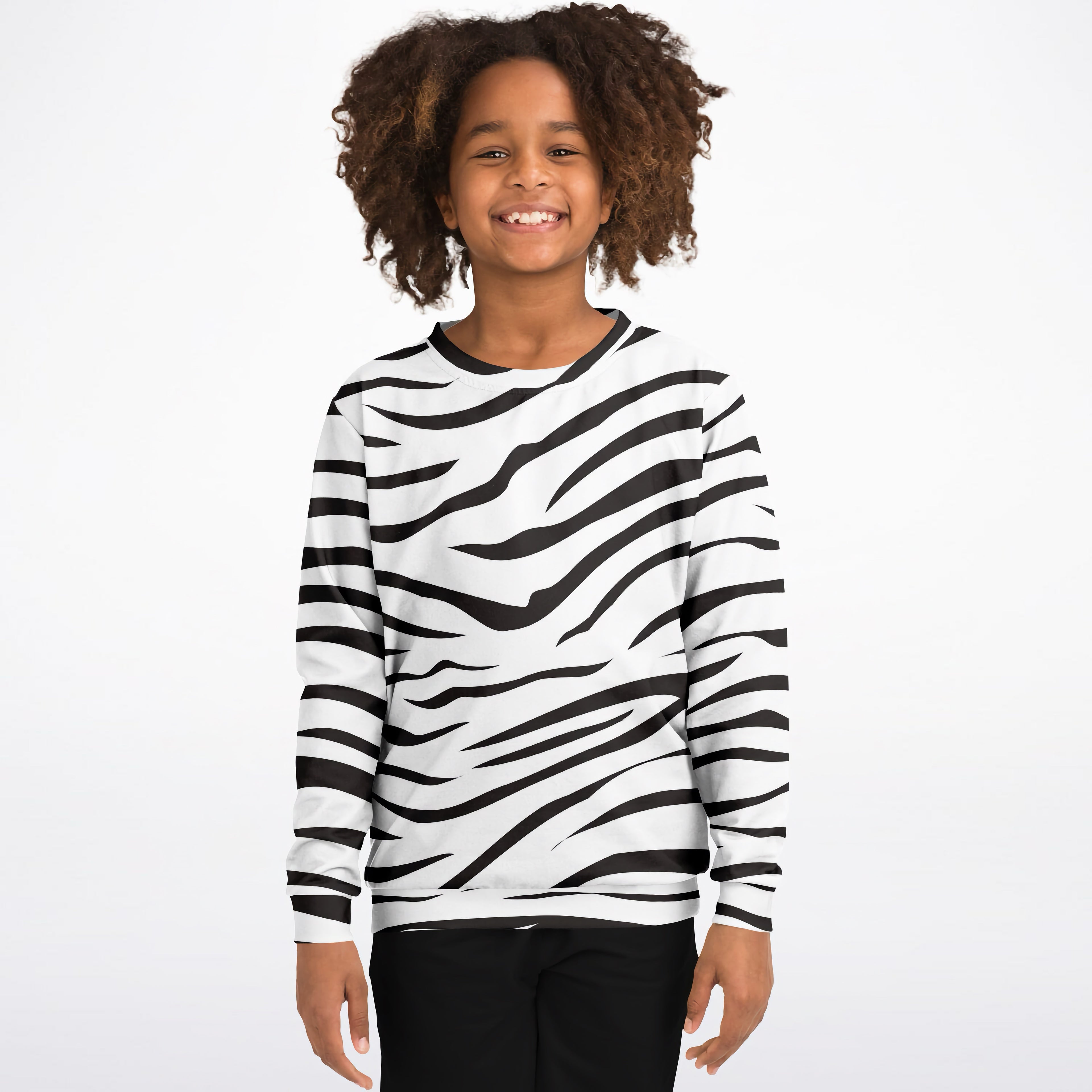 A child wearing a kids zebra print sweatshirt in black and white cozy cotton fleece for casual wear