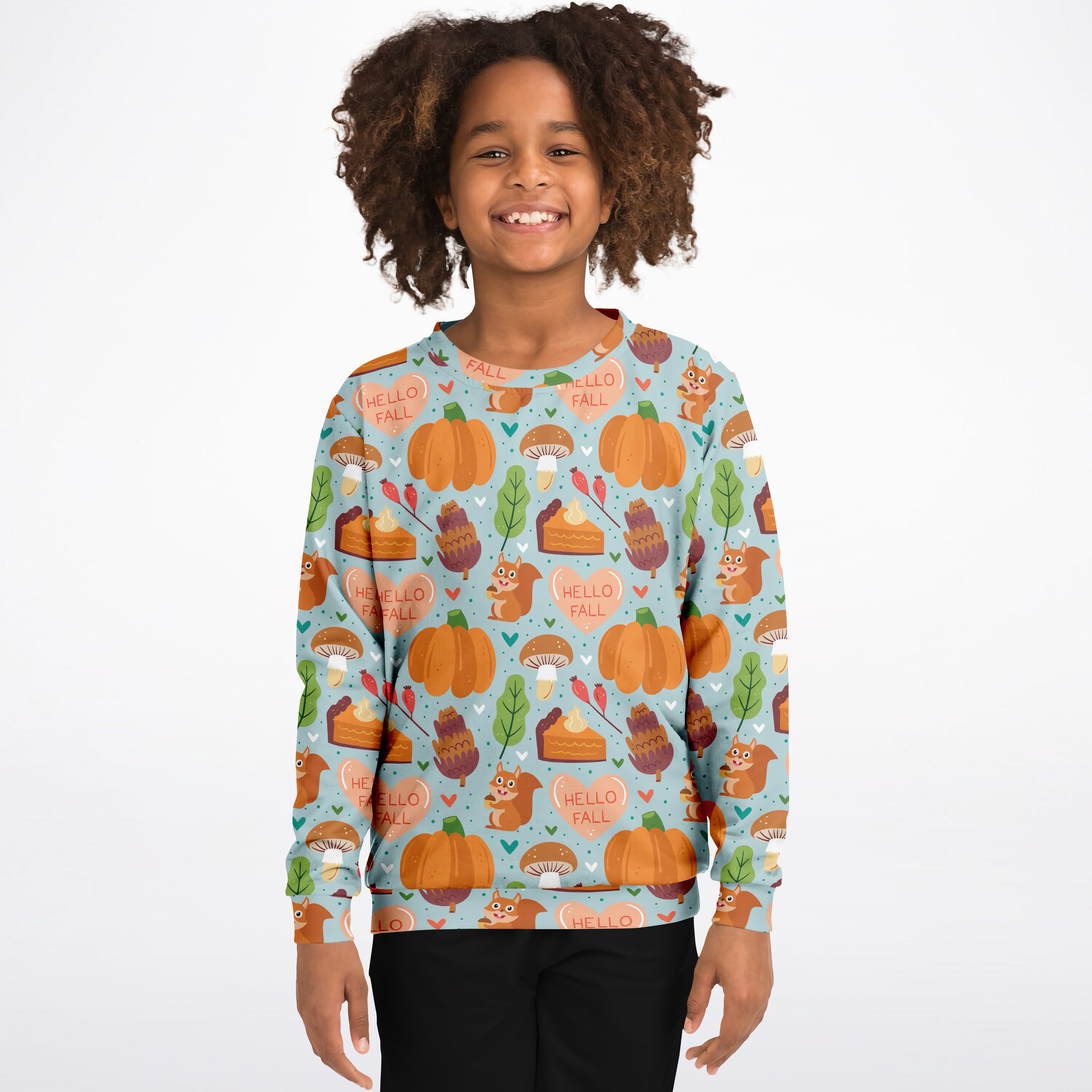 A child wearing a light blue kids hello fall autumn themed sweatshirt with pumpkins squirrels and pie slices in cotton fleece