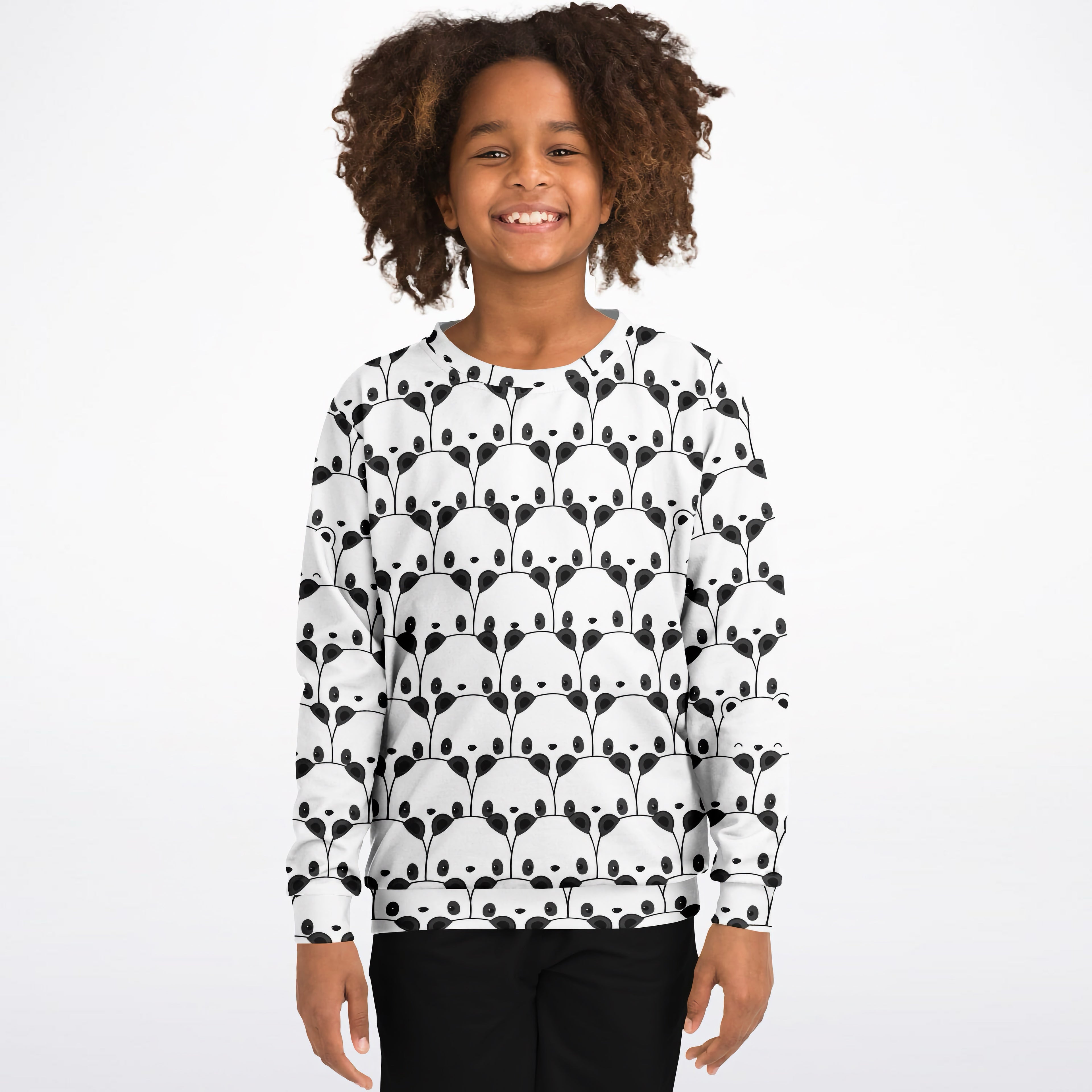 A child wearing a white kids panda sweatshirt with black panda faces made of cozy cotton fleece fabric