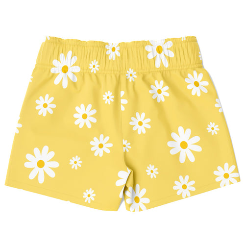 Boys yellow quick drying swim trunks featuring white daisy pattern perfect for summer water activities