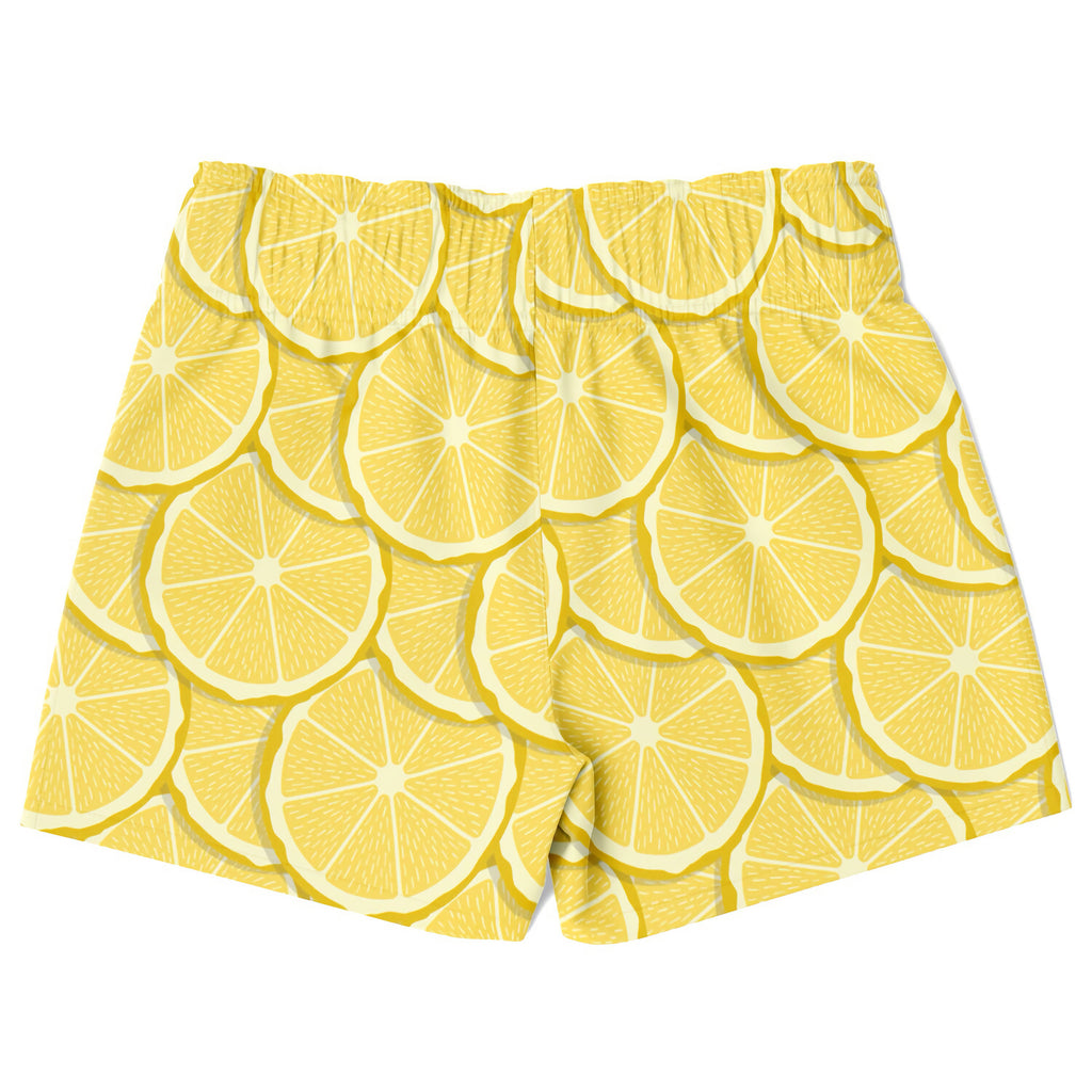 Boys lemon slice quick drying swim trunks with vibrant yellow lemon slice pattern perfect for beach and pool use