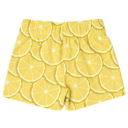 Boys lemon slice quick drying swim trunks with vibrant yellow lemon slice pattern perfect for beach and pool use
