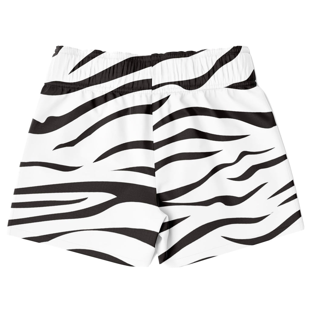 Boys zebra print quick drying swim trunks with black and white zebra stripes and elastic waistband