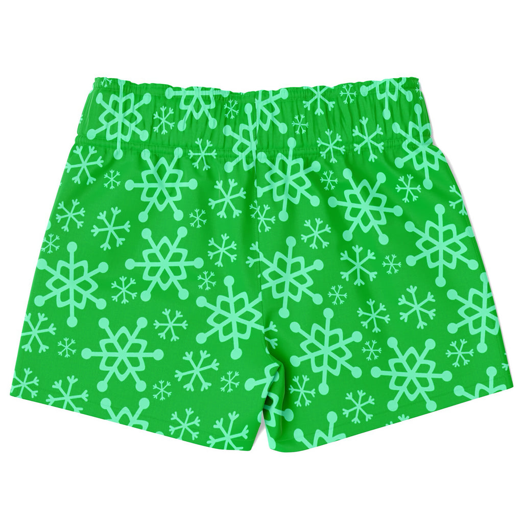Boys green snowflake Christmas quick drying swim trunks with bright green fabric and light mint snowflake pattern