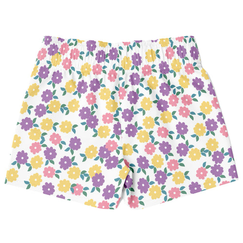 Boys colorful flower print quick drying swim trunks in white with purple yellow pink flowers and green leaves