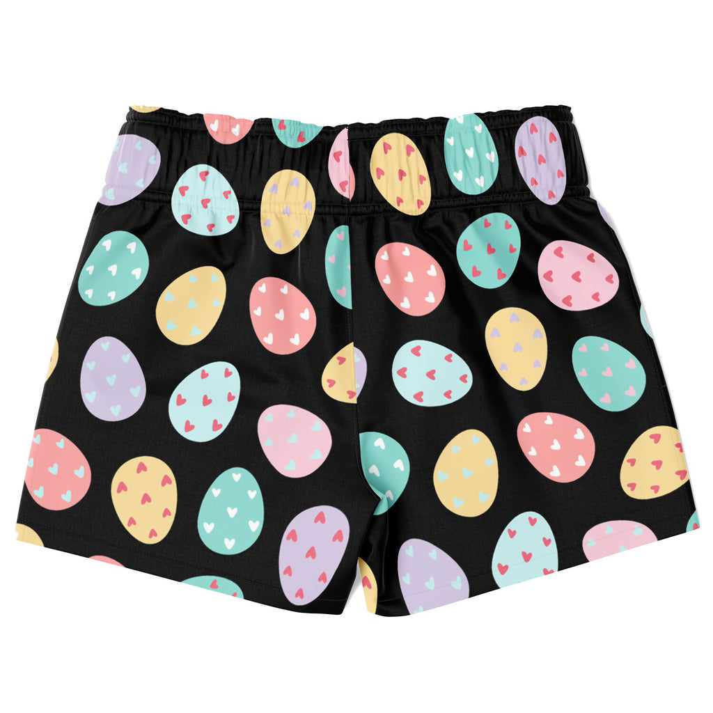 Boys easter egg quick drying swim trunks in black with pastel easter eggs and heart details pattern