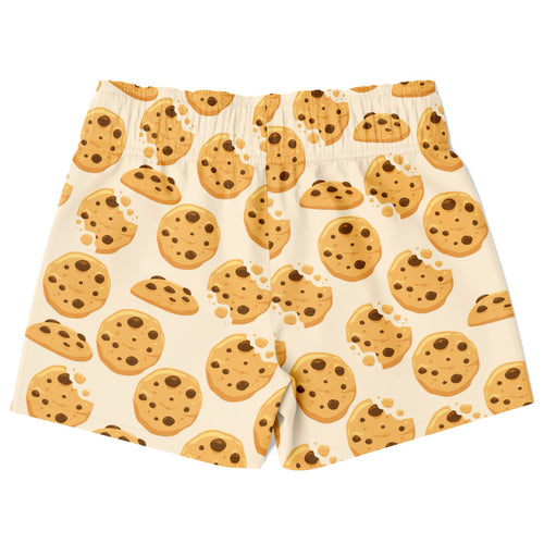 Cream-colored boys quick drying swim trunks with playful cartoon chocolate chip cookie pattern