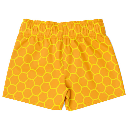 Boys honeycomb quick drying swim trunks in bright orange with a bold yellow honeycomb pattern