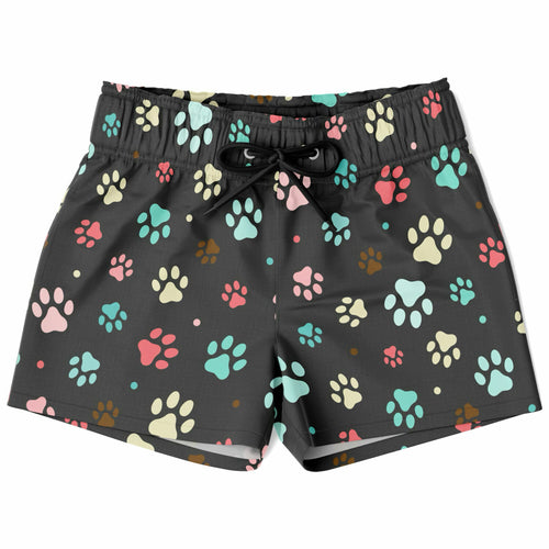 Black boys quick drying swim trunks with colorful pink teal cream and brown paw print pattern