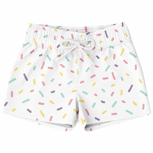 Boys colorful sprinkles quick drying swim trunks in white with a pastel pink yellow green and purple sprinkle pattern