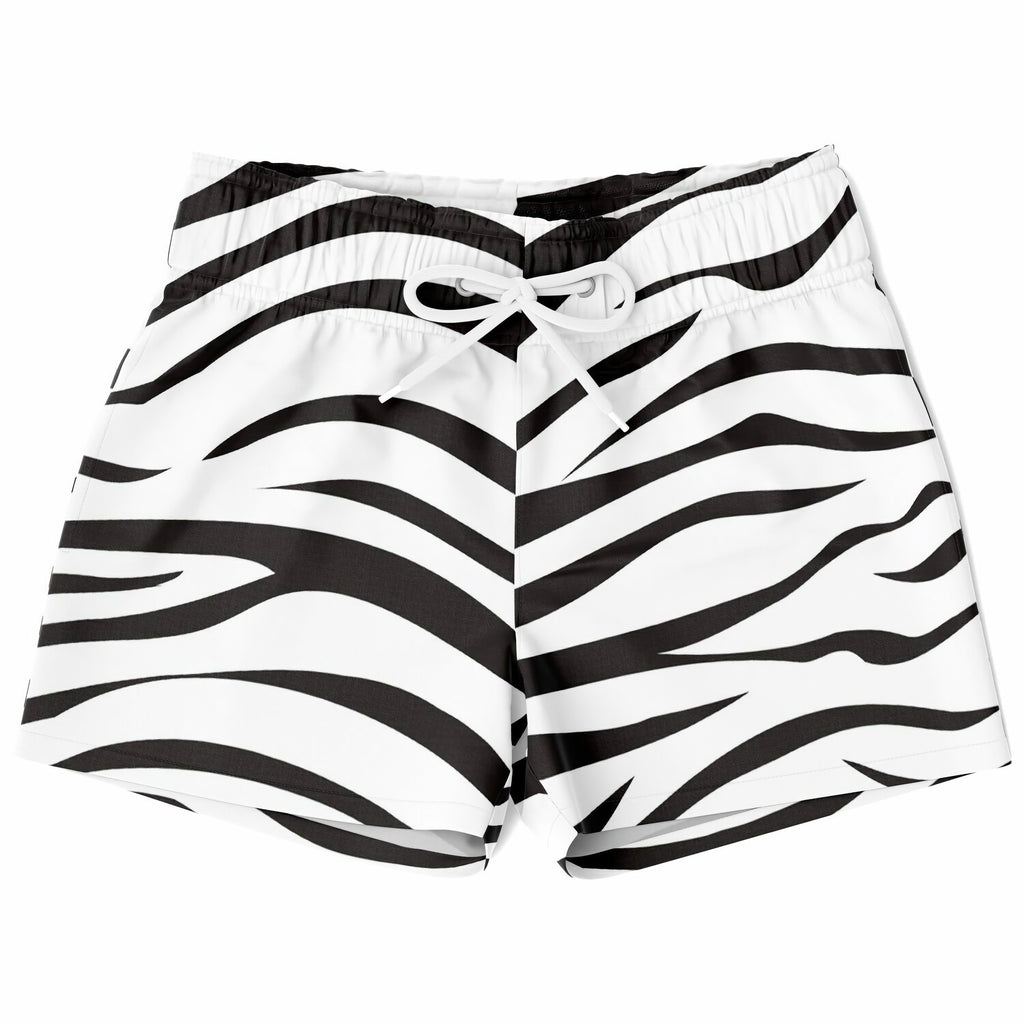 Boys zebra print quick drying swim trunks with black and white zebra stripes and a drawstring waistband
