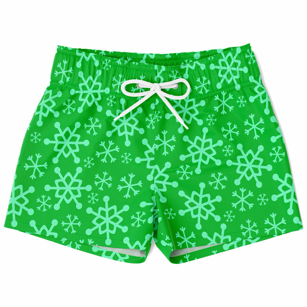 Boys green quick drying swim trunks with light mint snowflake pattern and white drawstrings for Christmas wear