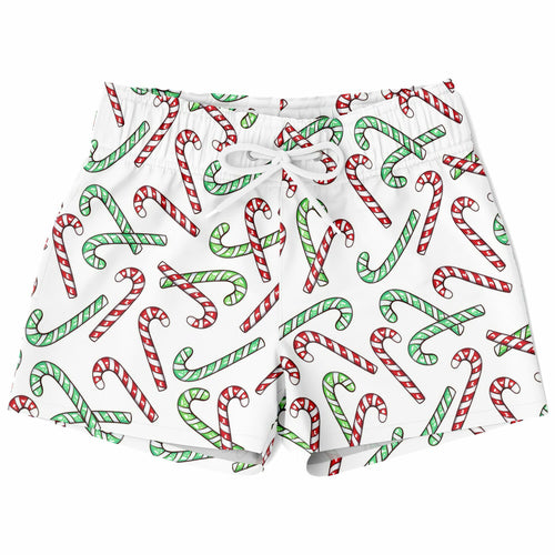 White boys swim trunks with red and green candy cane pattern quick drying for christmas beach use