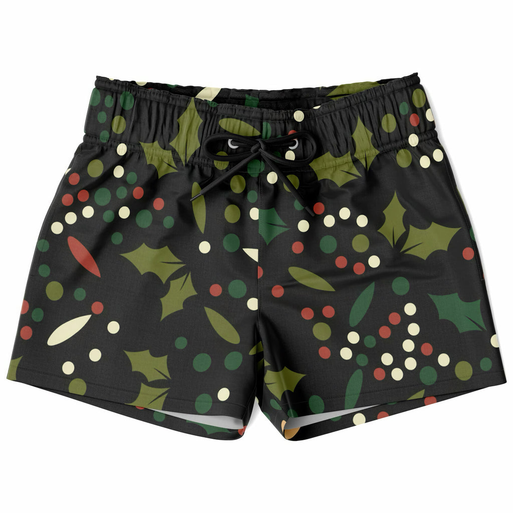 Black boys quick drying swim trunks with festive green red and white holly berry pattern