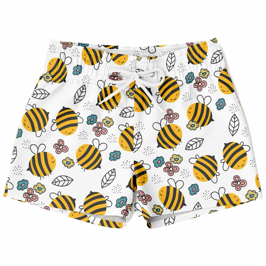 Boys bumblebee quick drying swim trunks in white with yellow and black bee pattern and colorful flowers and leaves