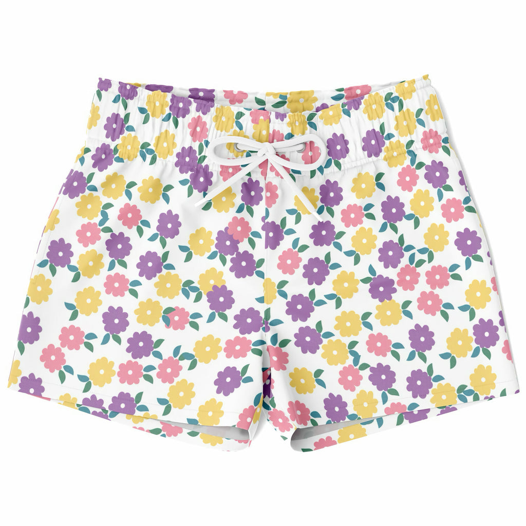 Boys colorful flower print quick drying swim trunks with white base and purple pink yellow floral pattern with green leaves