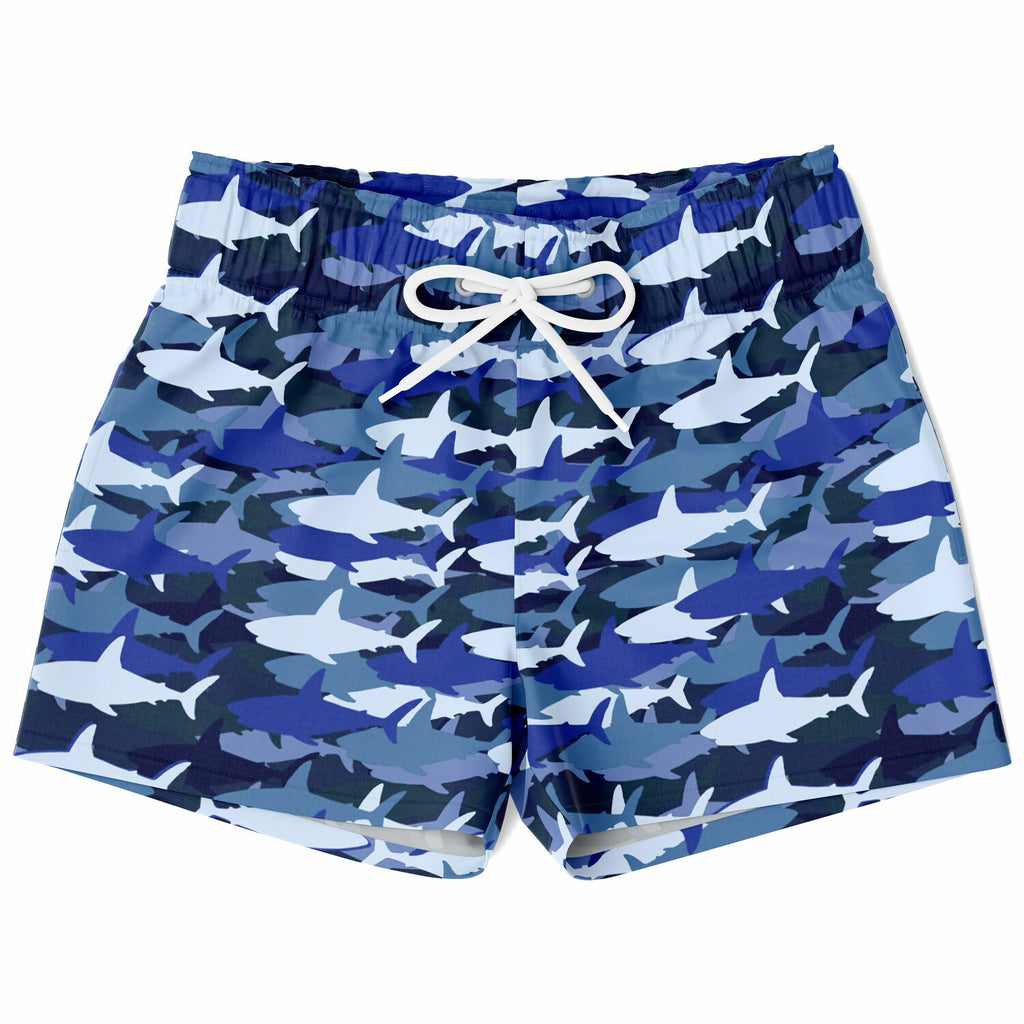 Boys blue shark quick drying swim trunks with blue and white shark pattern and drawstring waistband
