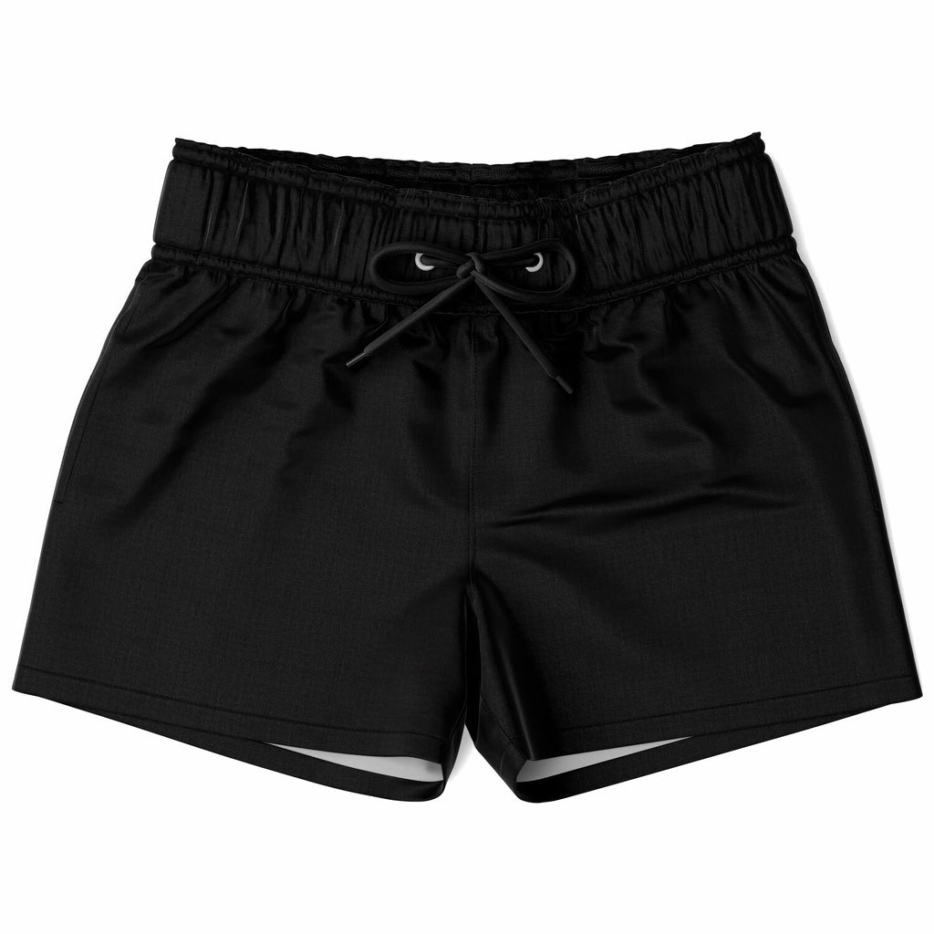 Boys black quick drying swim trunks in satin fabric with elastic waistband and matching drawstring