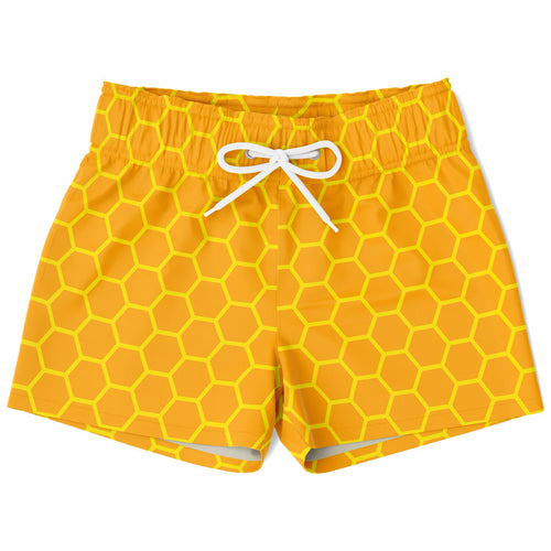 Boys honeycomb quick drying swim trunks in bright yellow with bold honeycomb pattern and white drawstrings