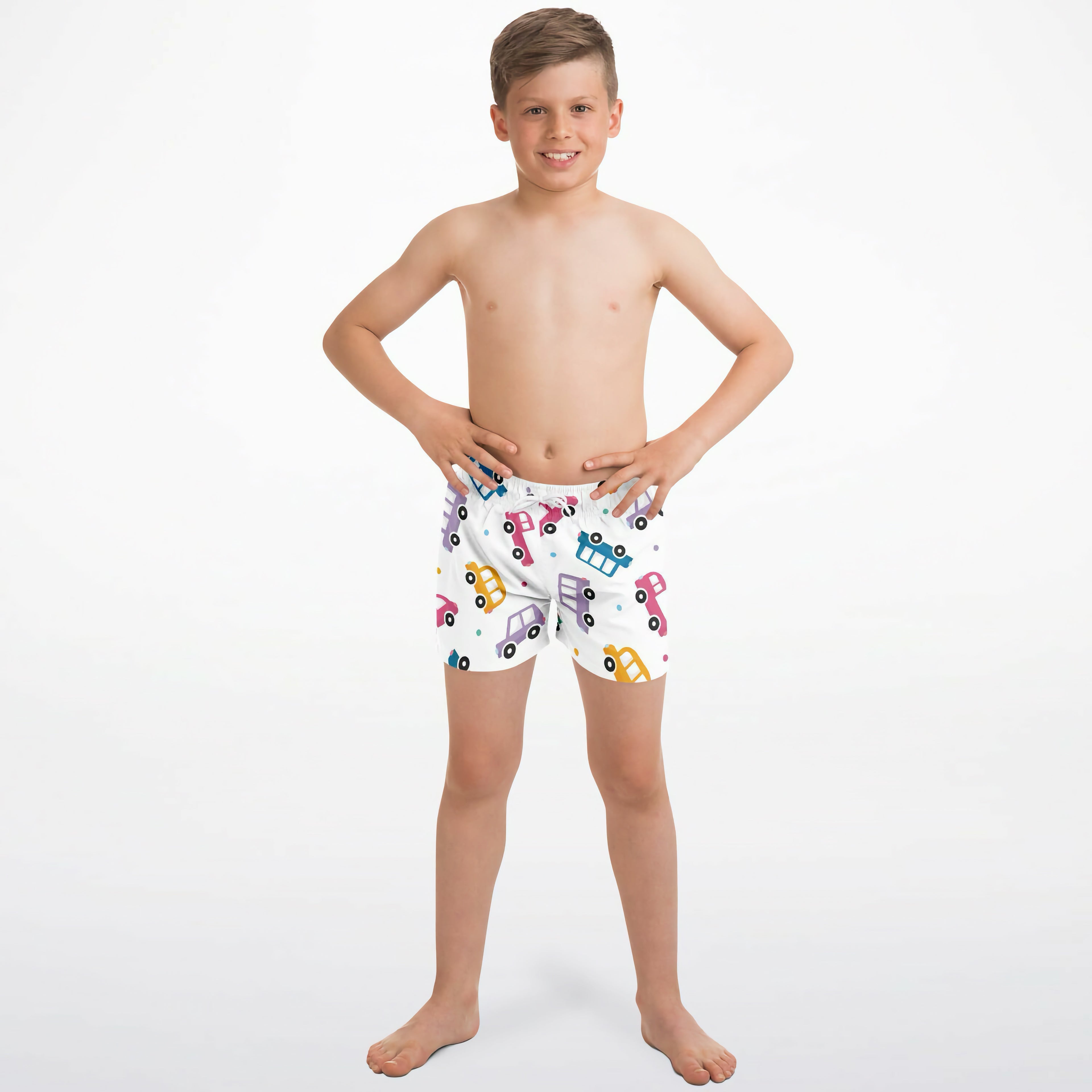 Boys colorful car quick drying swim trunks in white with a playful pattern of pink blue yellow and purple cars