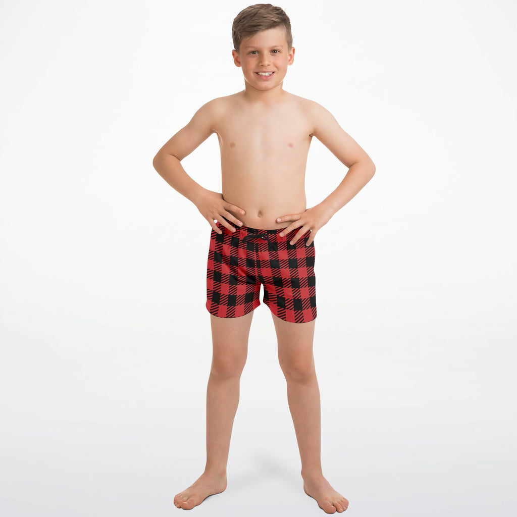 Boys red buffalo plaid Christmas quick drying swim trunks in red and black plaid pattern for swimming and beachwear