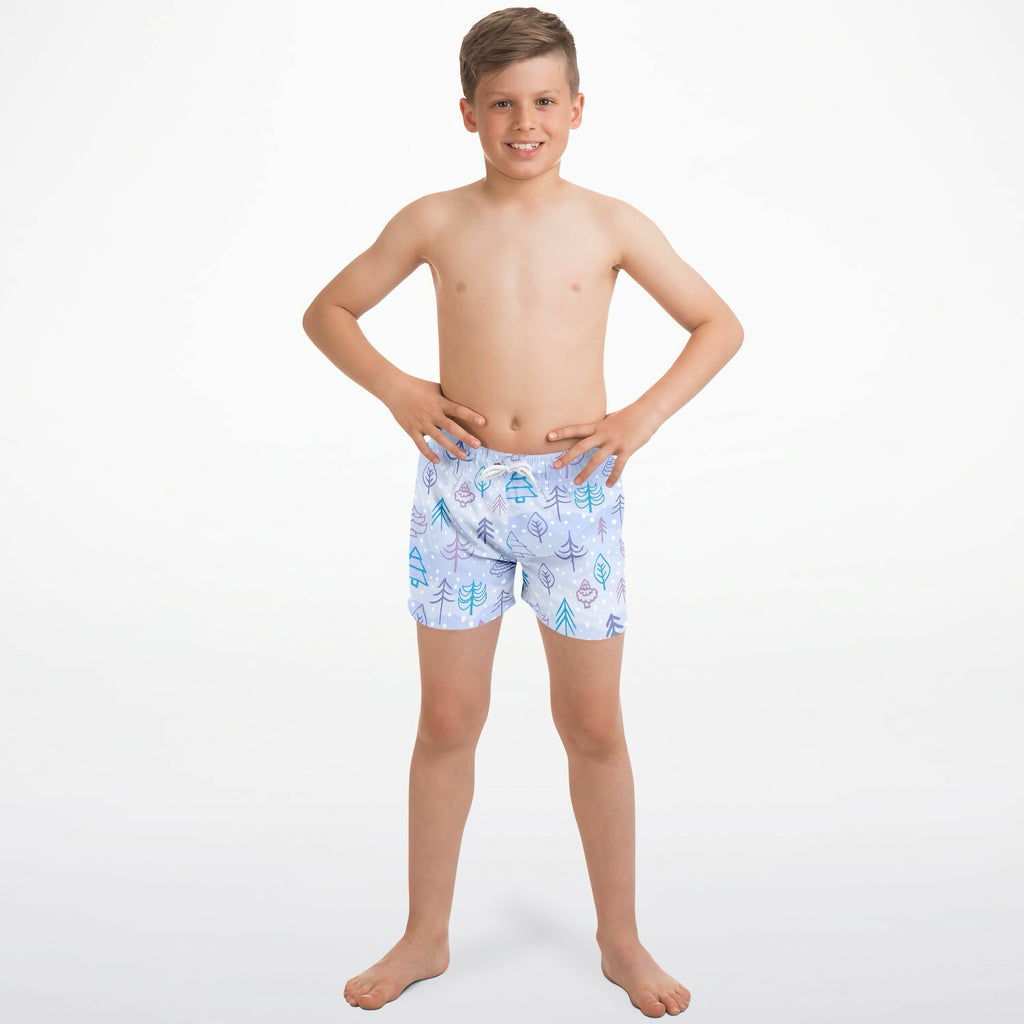 Boys winter snow quick drying swim trunks in light blue with teal purple and white stylized tree and leaf pattern