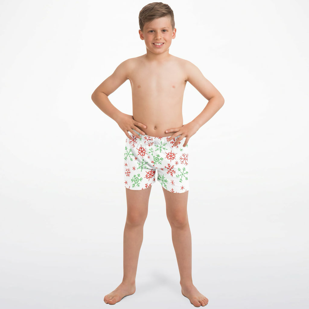 Boys red and green snowflakes christmas quick drying swim trunks in white with festive snowflake pattern