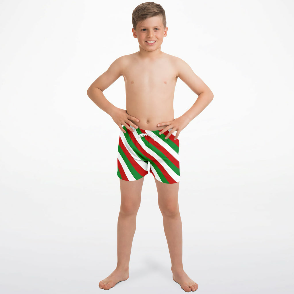 Boys festive candy cane stripe quick drying swim trunks with red green white diagonal stripes and drawstring waistband