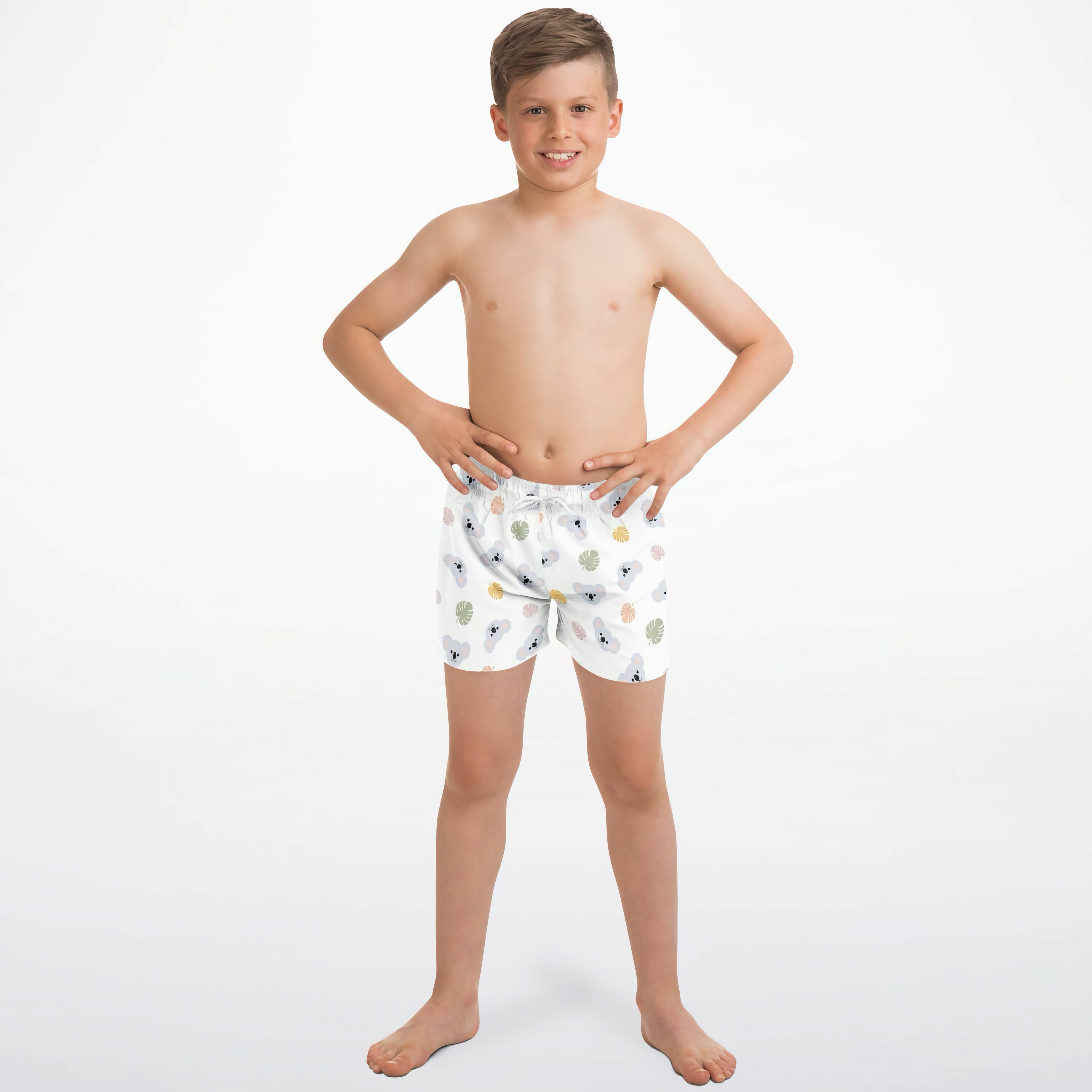 White boys koala bear quick drying swim trunks with playful gray and yellow seashell fish and coral pattern