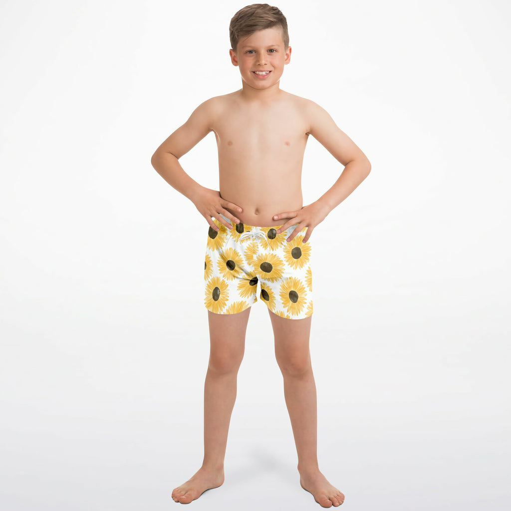 Boys doodle sunflower quick drying swim trunks with yellow sunflower pattern black centers on white fabric