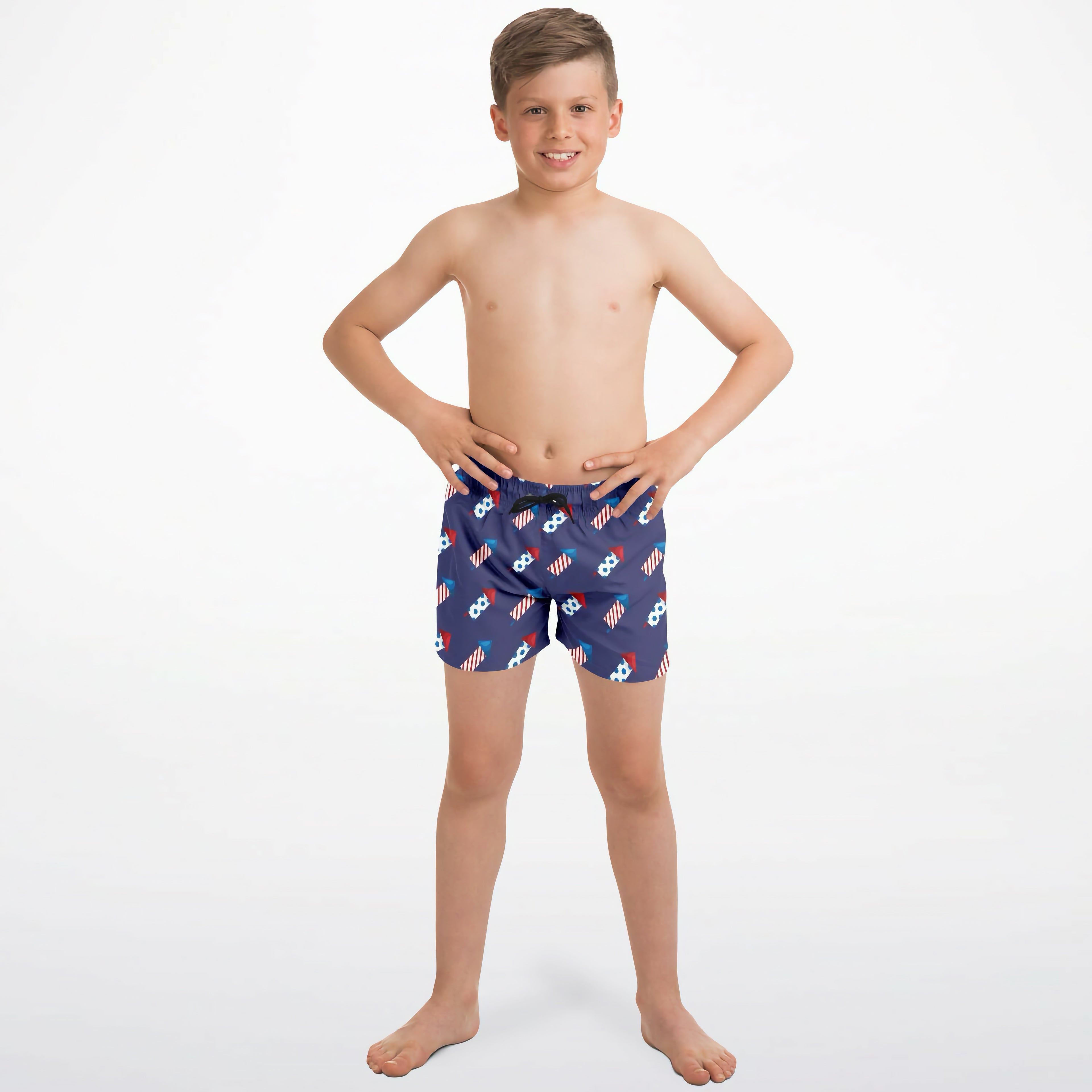 Boys firework rocket quick drying navy blue swim trunks with white soccer balls and red white and blue striped flags pattern