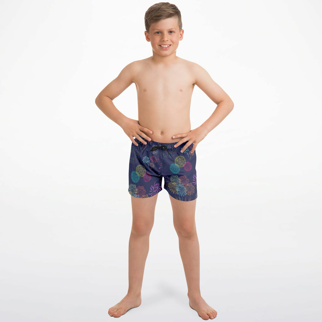 Boys fireworks quick drying navy blue swim trunks featuring multicolored fireworks pattern for summer fun