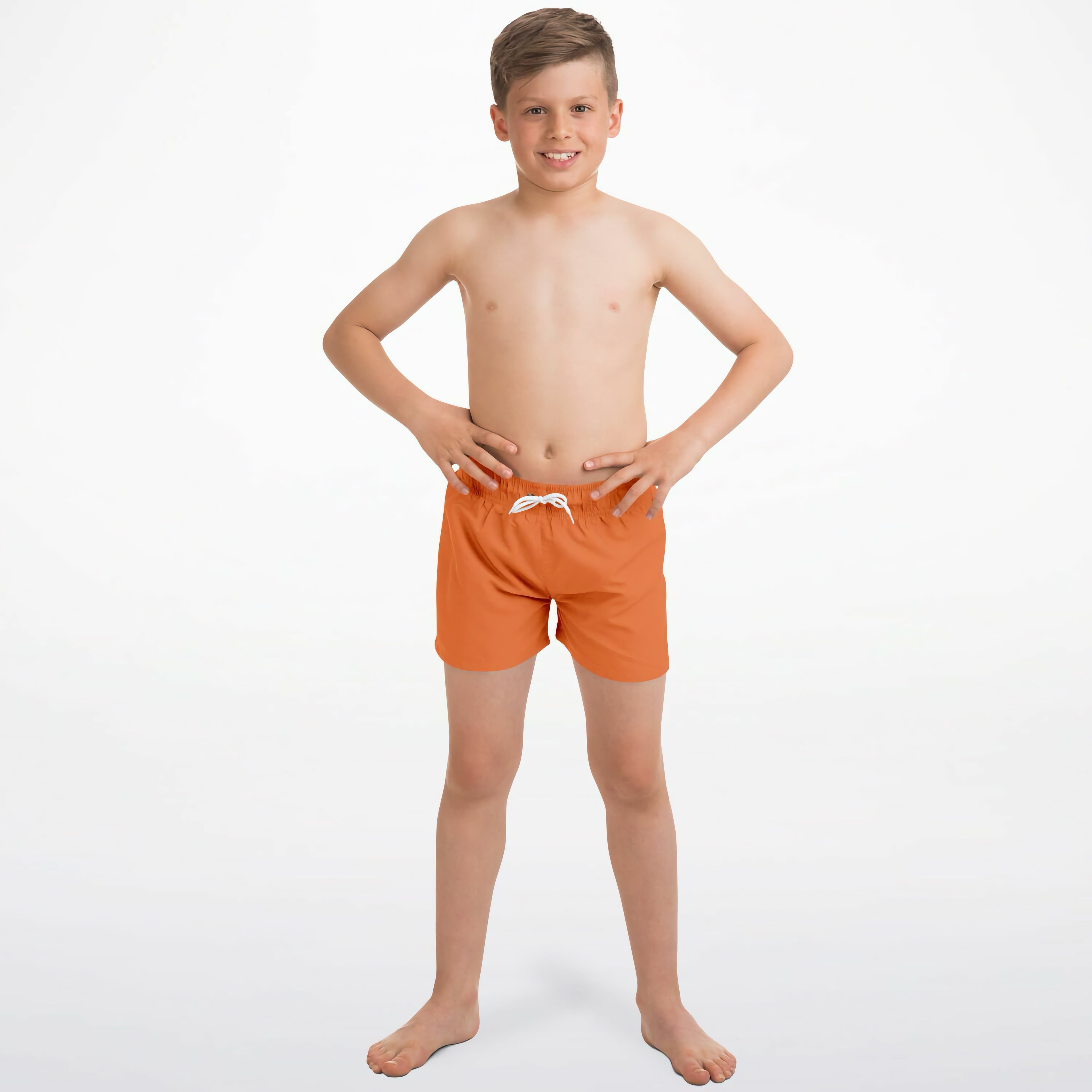 Boys orange quick drying swim trunks with bright orange fabric and a white drawstring waistband for swimming