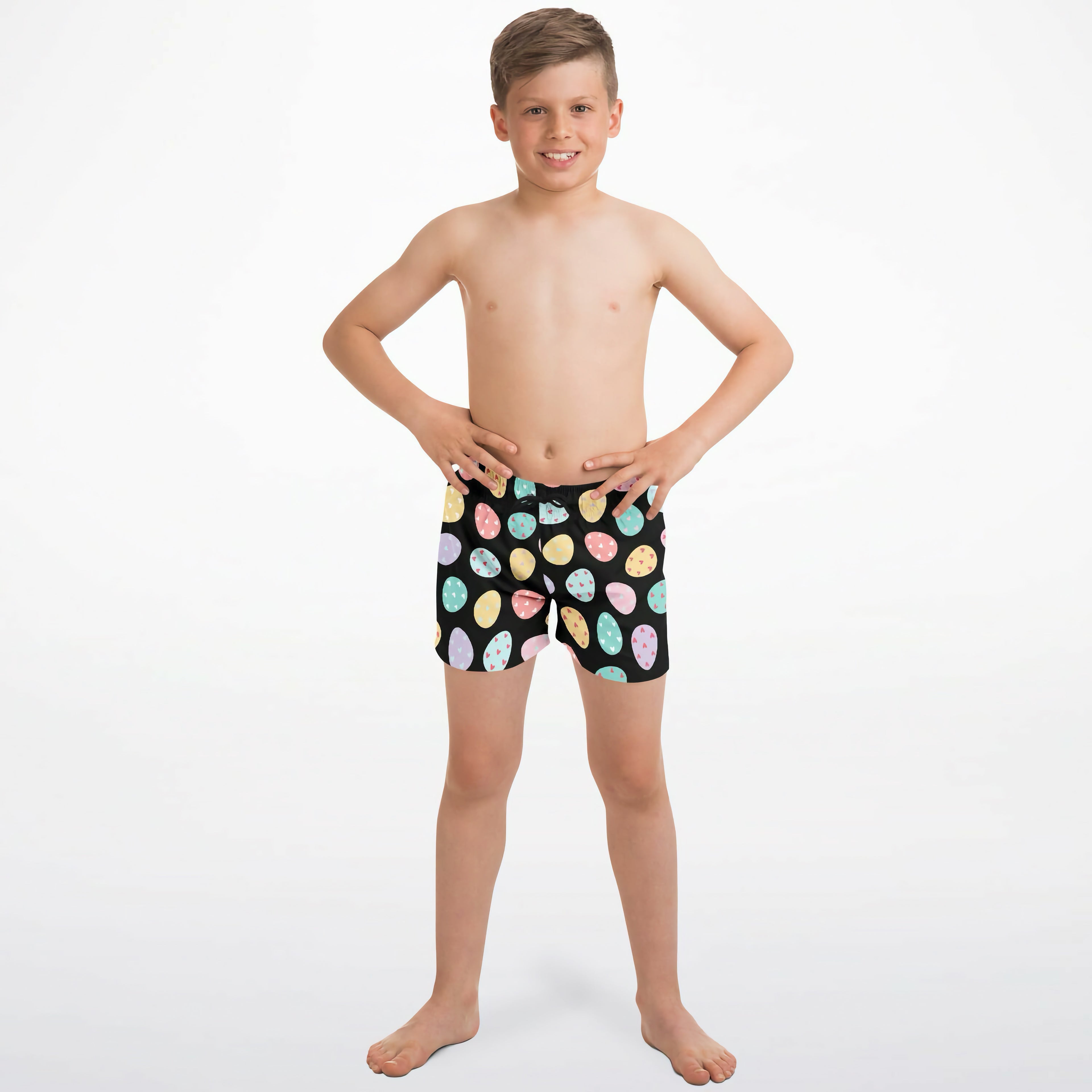 Boys easter egg quick drying swim trunks in black with pastel pink yellow blue and green egg pattern for swimming
