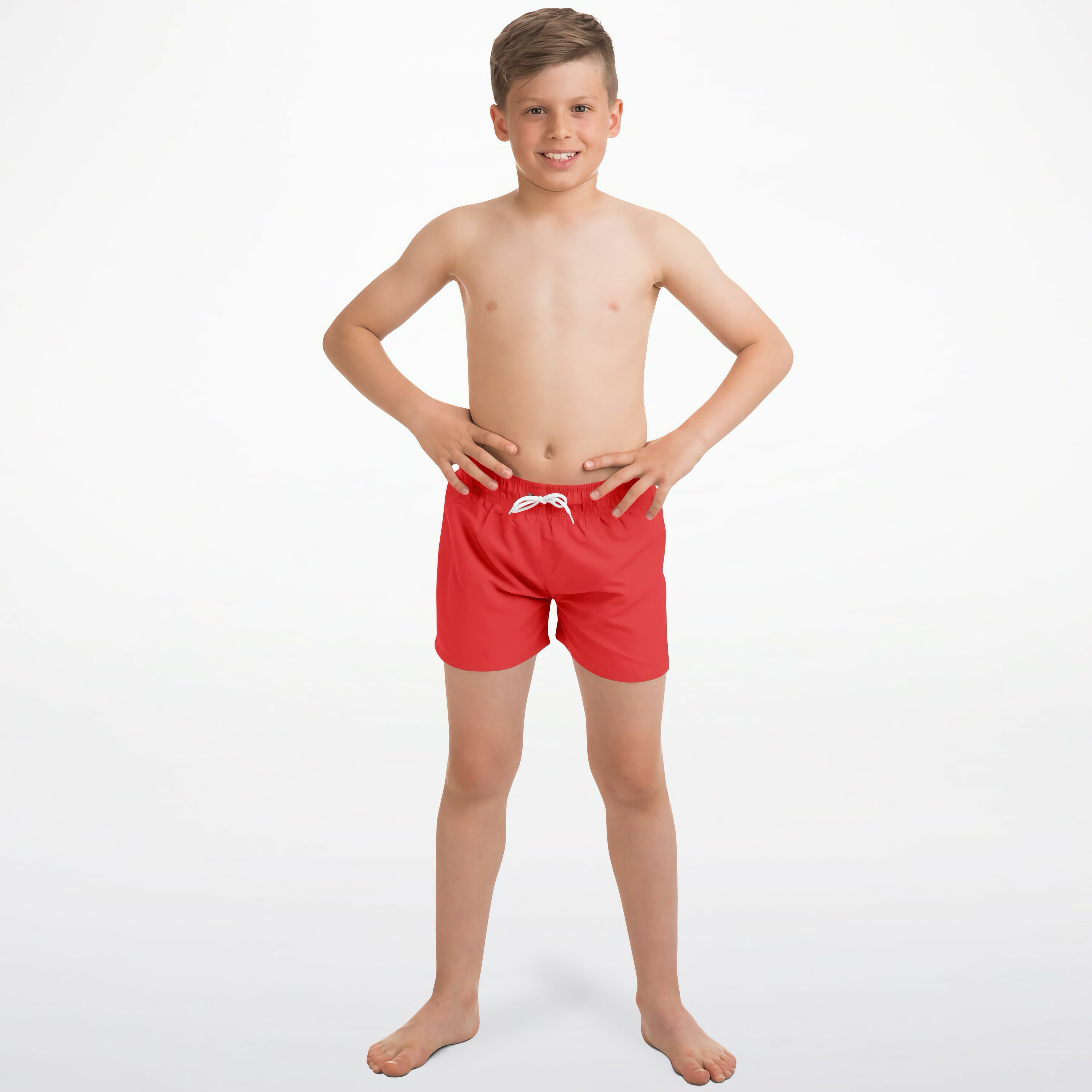 Boys red quick drying swim trunks with white drawstring waistband designed for swimming and water activities